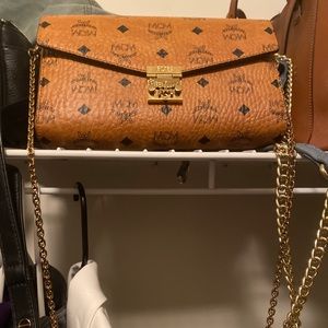 . “Millie flap cross body in visetos”